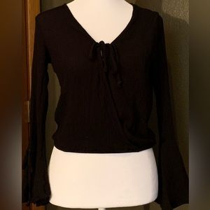 Rue 21 black crinkle blouse with trumpet sleeves and cross over front tie neck